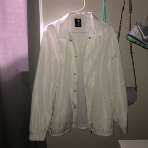 White windbreaker